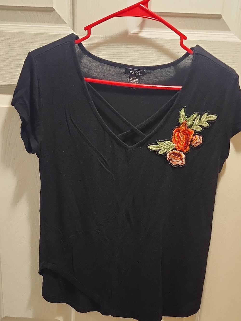 Rue21 Black V-Neck Tee with Orange Floral Patch